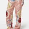 Scotch & Soda Gia - Mid rise wide leg elasticated trousers Abstract sun pink